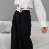 Abril - Pantalón Asimétrico con Cintura de Contraste